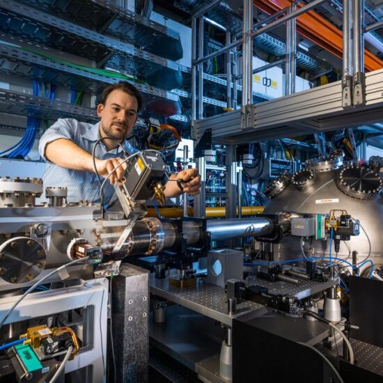 Laser strums atoms trillions of times in search for better computers